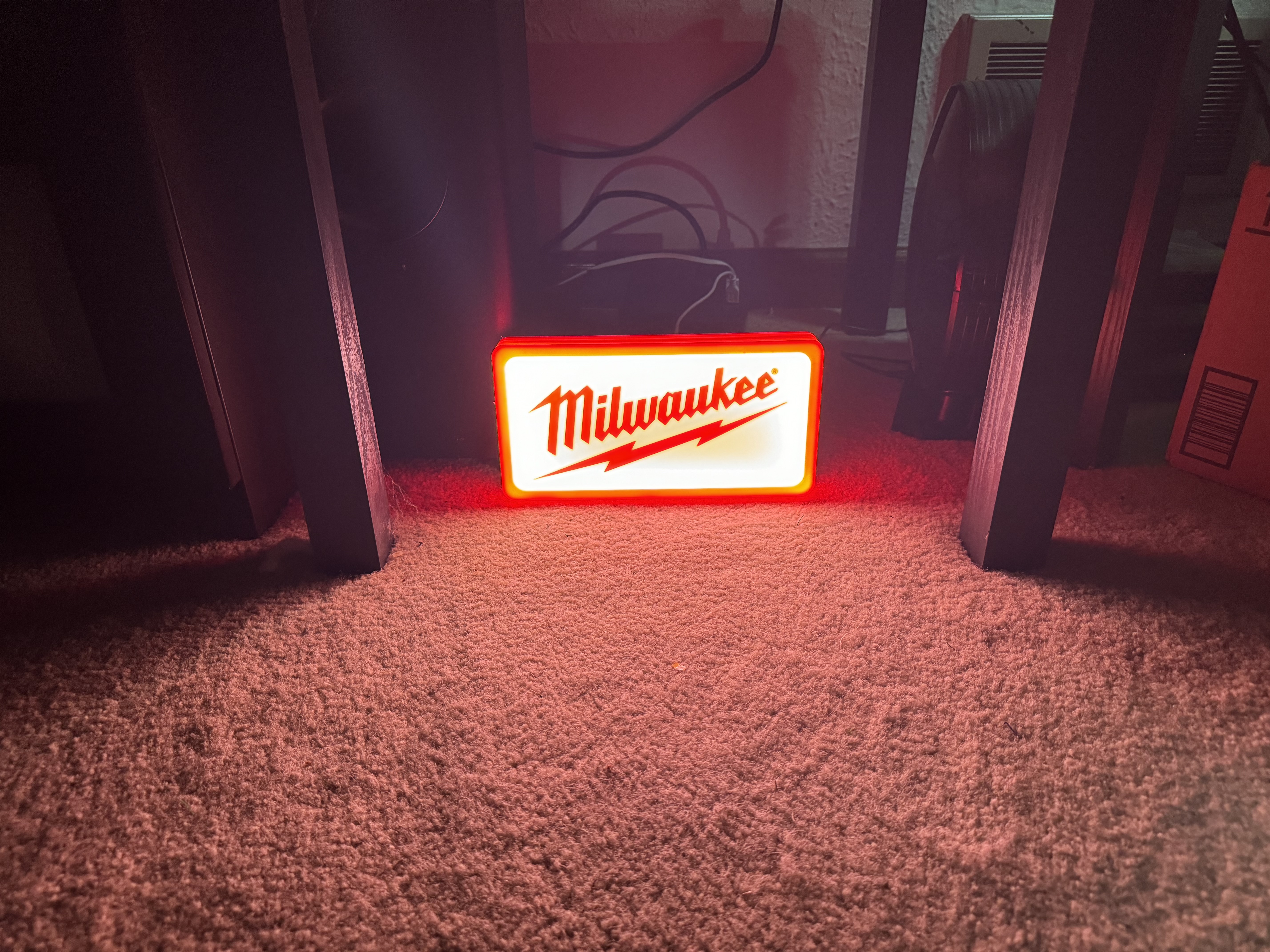 Milwaukee lightbox glowing red